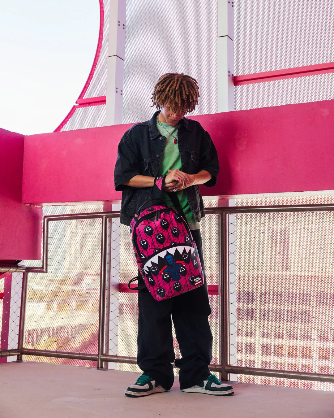 Sprayground X Squid Game Lined Up Front Man & Pink Guard Shark DLXSV Backpack